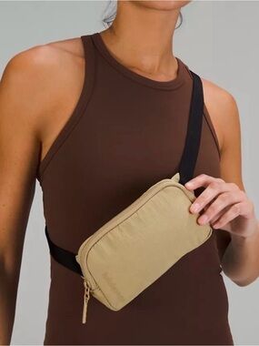 Lululemon Everywhere Mini Belt Bag Vertical Spelled Out Logo Trench Tan .7L